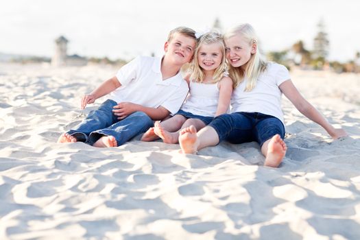 Adorable Sisters and Brother Having A Lot Fun at the Beach.