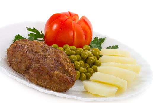 close-up meat rissole with vegetables, isolated on white