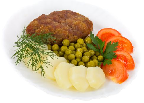 close-up meat rissole with vegetables, isolated on white