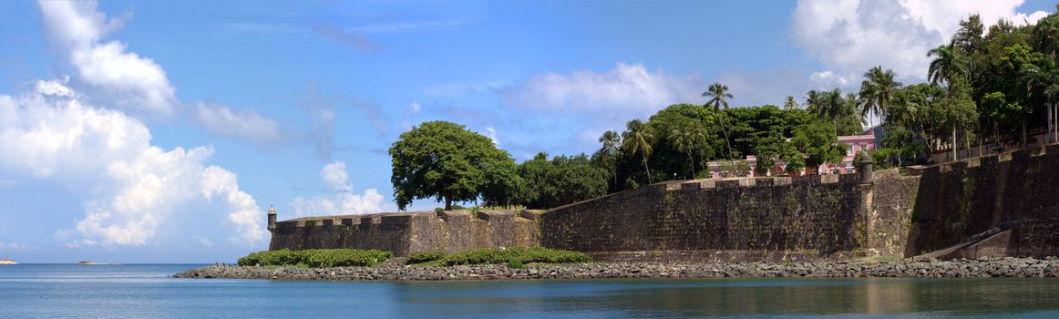 The city boundary and old decaying wall of El Morro fort located in Old San Juan Puerto Rico.