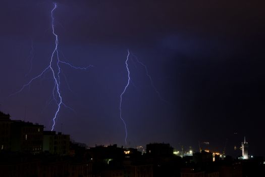 Lightning into the sea near the port of Genoa