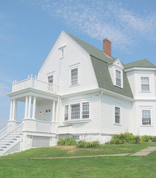 a late 19th century light keepers house, under a blue sky