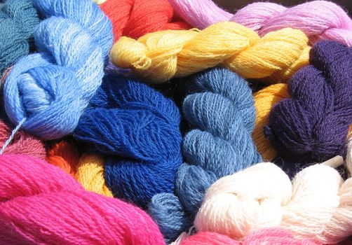 hand-spun wool yarn in colorful skeins