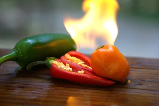 Extreamly hot peppers on fire cut open.