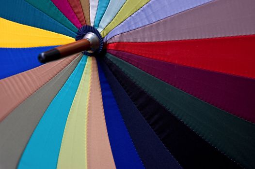 close up of rainbow colored upbrella