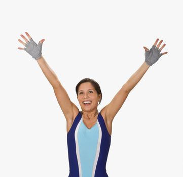 Close-up of a happy winner girl against a white background.