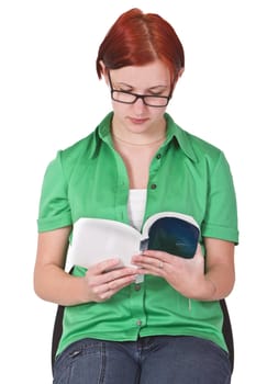 Portrait of a redheaded girl with glasses reading a book.Shot with Canon 70-200mm f/2.8L IS USM