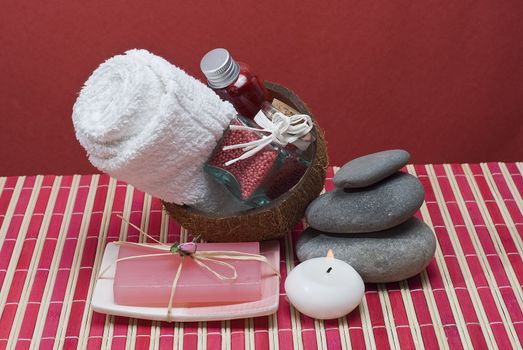 Still life about spa with some hygiene items in red.