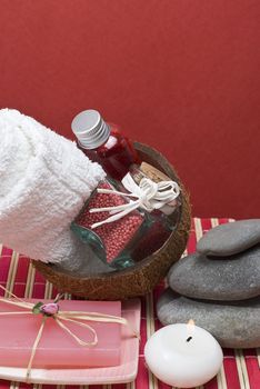 Still life about spa with some hygiene items in red.