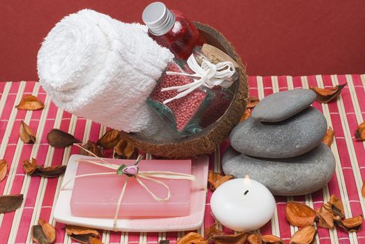 Still life about spa with some hygiene items in red.