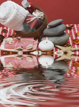 Still life about spa with some hygiene items in red.