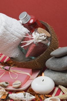 Still life about spa with some hygiene items in red.