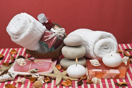 Still life about spa with some hygiene items in red.