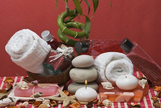 Still life about spa with some hygiene items in red.