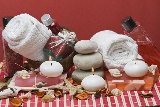 Still life about spa with some hygiene items in red.