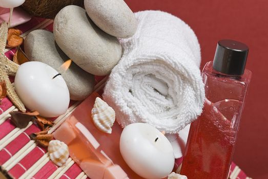 Still life about spa with some hygiene items in red.