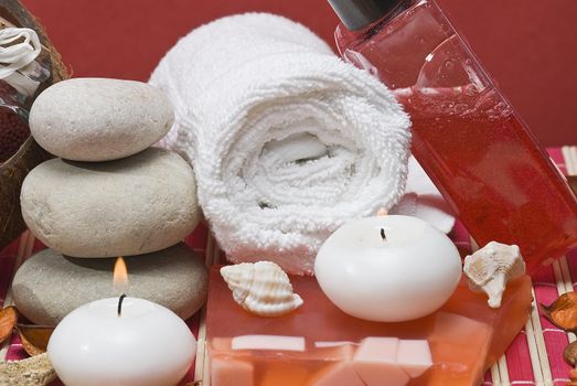 Still life about spa with some hygiene items in red.