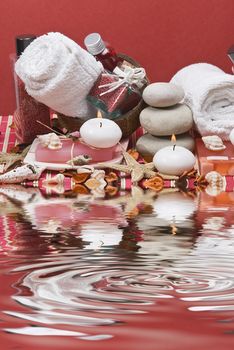 Still life about spa with some hygiene items in red.