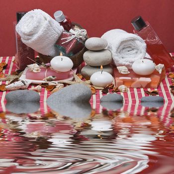 Still life about spa with some hygiene items in red.