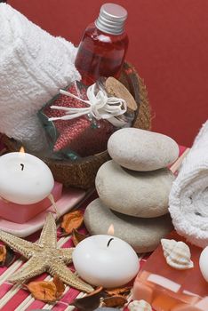 Still life about spa with some hygiene items in red.