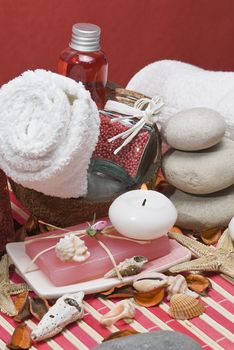 Still life about spa with some hygiene items in red.