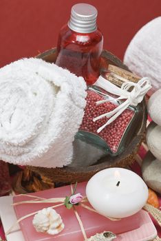 Still life about spa with some hygiene items in red.