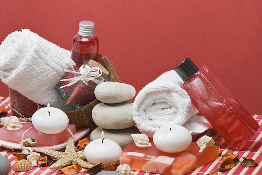 Still life about spa with some hygiene items in red.