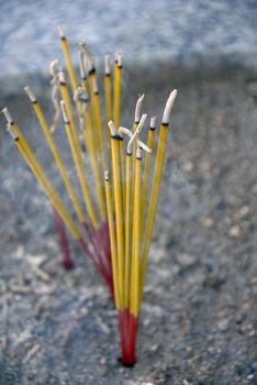 an isolated shot of Incense Sticks Burning in Chinese Temple