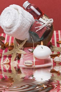 Still life about spa with some hygiene items in red.