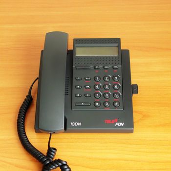 digital(ISDN) telephone  on color background  
