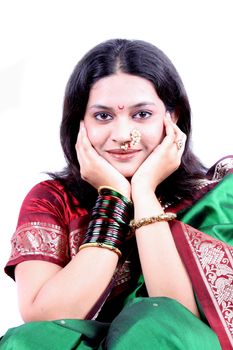 A pretty Indian woman in a traditional attire.