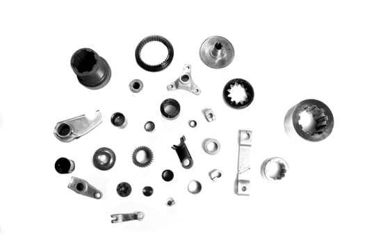 Various parts of a industrial machinery like broaches and gears.
