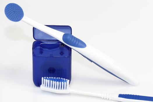 Dental care products on bright background