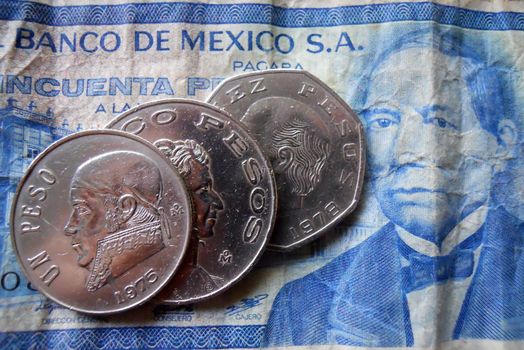           mexican money 3 peso coins and a centavo bill in excellent condition