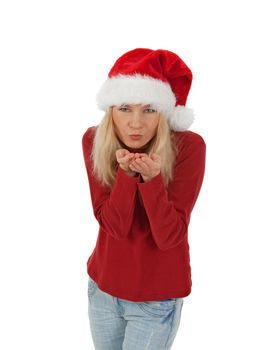 Santa girl wearing Christmas hat sending a kiss. Isolated on white.