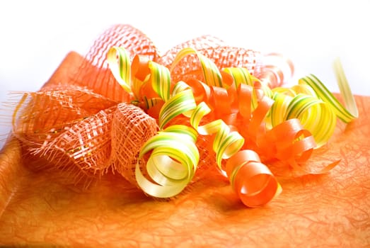 orange decorated gift box with ribbon