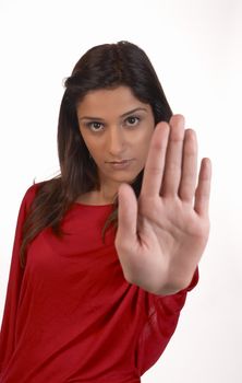 Young middle eastern woman in a determined refusal attitude