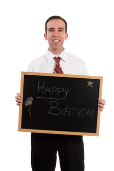 A young man wearing a suit is holding a sign that says happy birthday, isolated against a white background
