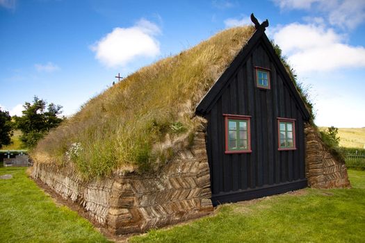 Old wooden church at Vidimyri. Iceland summer sunny day.