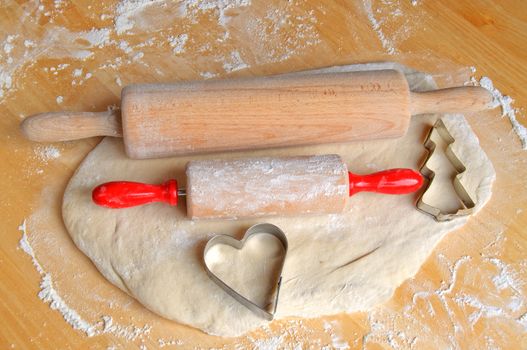 Rolling pins with dough and two shapes