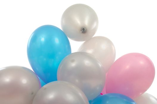 A pile of balloons on white background