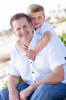 Cute Son with His Handsome Dad Portrait at the Beach