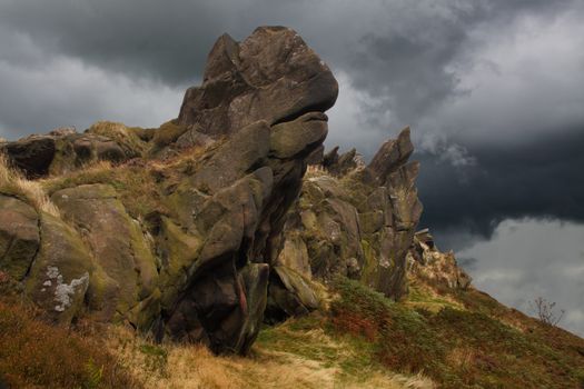 Strange face like rock formations at Ramshwa Rocks in the Staffordshire Moorlands, in England.