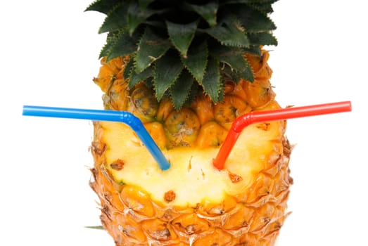 ripe vivid pineapple with red and blue straw over white background