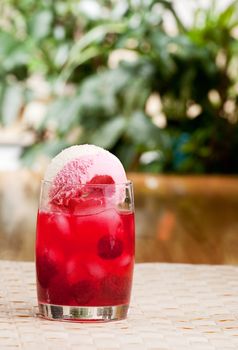 A raspberry float in an outdoor setting