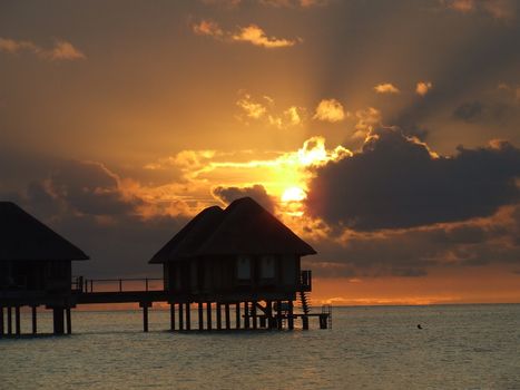 A beautiful tropical sunset, glowing in amazing warm colours