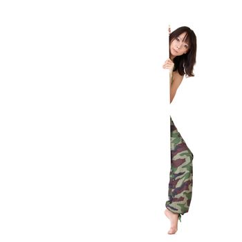Young Asian woman holding blank billboard over white background.
