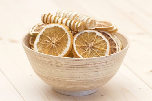 bowl with slices of dried oranges