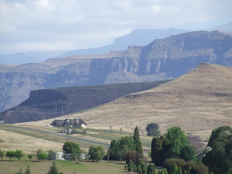 View of a vast mountain from a distance on a hot, hazy summer's day