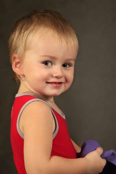 Photo of small boy looking at camera